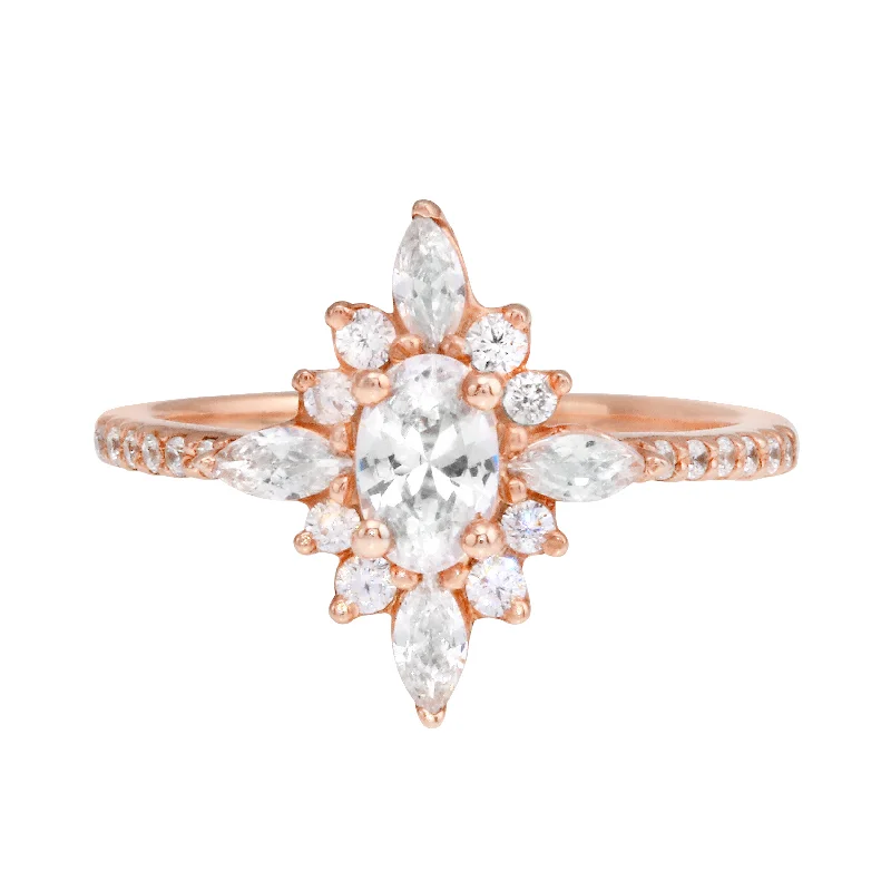 Oval Diamond and Starburst Flower Halo Engagement Ring