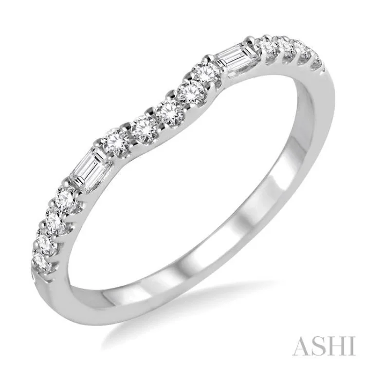 1/4 ctw Curved Center Baguette and Round Cut Diamond Wedding Band in 14K White Gold